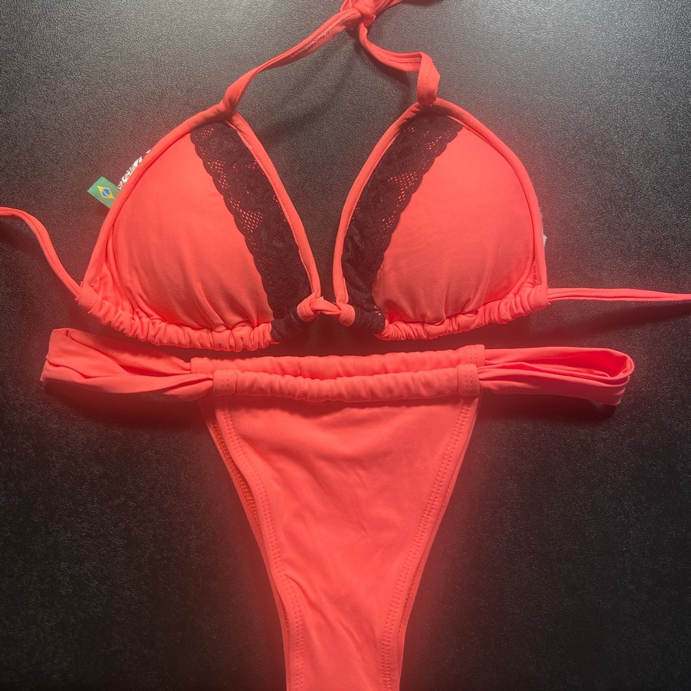 Coral bikini with lace detail on top size M